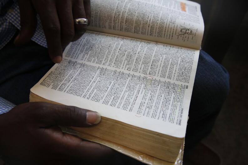 The inside of a Webster's dictionary.