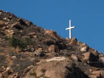 Erected over 50 years, the towering Christian cross atop Riverside’s Mount Rubidoux is now the target of a possible civil liberties lawsuit over separation of church and state.

