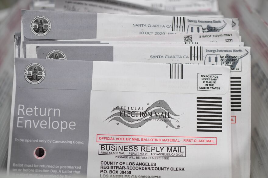 Mail-in ballots in their envelopes await processing at the Los Angeles County Registrar Recorders' mail-in ballot processing center at the Pomona Fairplex in Pomona, California, October 28, 2020. - Officials relocated mail-in ballot processing to the expansive location due to the need for COVID-19 social distancing for the ballot workers and the large number of mail-in ballots. While the tabulation of votes cast for Donald Trump and Joe Biden will begin when polls close on November 3 at 8pm, envelopes are now being sorted and signatures and ballots verified to expedite the tabulation process on November 3. (Photo by Robyn Beck / AFP) (Photo by ROBYN BECK/AFP via Getty Images)