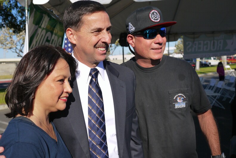 Todd Rogers, Assistant Sheriff for the Los Angeles Sheriff Department, poses outside a campaign event in Carson. He's a candidate for LA County Sheriff.