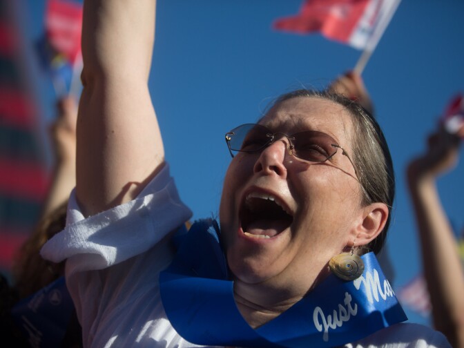 Nancy Grass cheers during a celebration for gay marriage rulings in West Hollywood.
