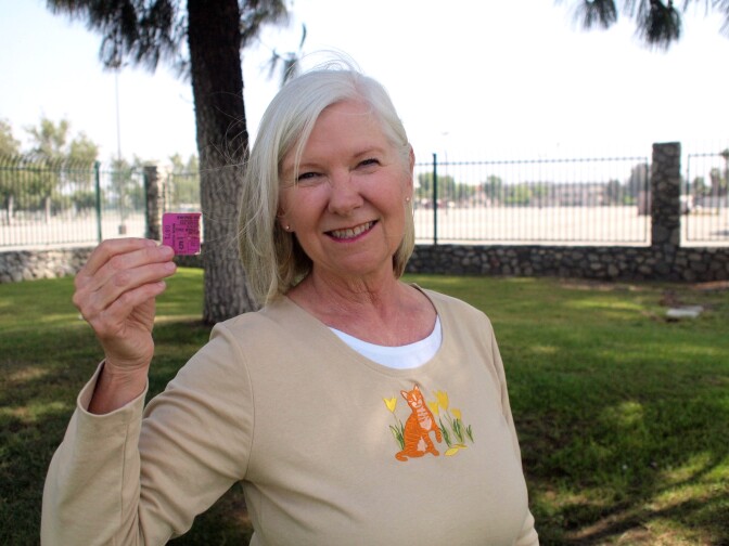 LoRee Gastineau of Highland, CA holds her ticket stub for the Rolling Stones first show in the United States.