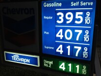 Gasoline prices continue to drop in Southern California. The Automobile Club of Southern California said Monday the average price is $3.90 for a gallon of self-serve regular in L.A. County and $3.87 in Orange County. (Photo: Newport Beach gas station prices April 29, 2013)  