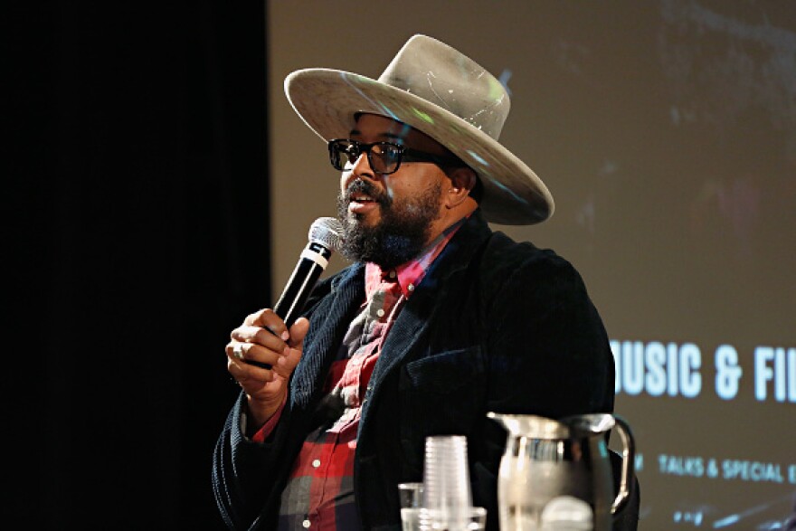 NEW YORK, NY - OCTOBER 10: Erin Davis, son of Miles Davis, attends Music Discussions with Galadrielle Allman, Erin Davis, Vince Wilburn Jr., Stephen Trask and A.O. Scott during CBGB Music & Film Festival 2014 on October 10, 2014 in New York City. (Photo by Cindy Ord/Getty Images for CBGB)