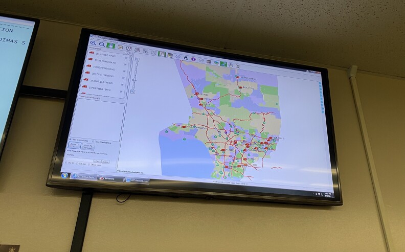 A screen at MET dispatch center in South El Monte displays the location of units across the county.