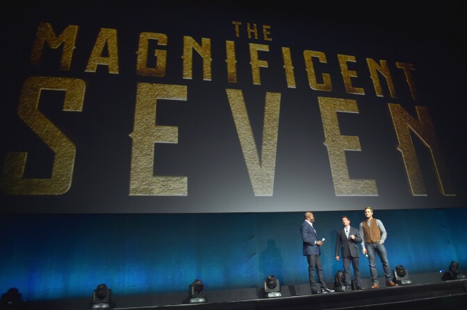 LAS VEGAS, NV - APRIL 12:  (L-R) 'The Magnificent Seven' director Antoine Fuqua, Sony Pictures Entertainment President of Worldwide Distribution Rory Bruer and actor Chris Pratt speak onstage during CinemaCon 2016 An Evening with Sony Pictures Entertainment: Celebrating the Summer of 2016 and Beyond at The Colosseum at Caesars Palace during CinemaCon, the official convention of the National Association of Theatre Owners, on April 12, 2016 in Las Vegas, Nevada.  (Photo by Alberto E. Rodriguez/Getty Images for CinemaCon)