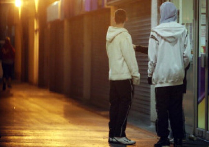 Young persons in hooded tops gather on a housing estate east of Bristol city centre February 1, 2007, Bristol, England.