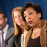 WASHINGTON, DC - JUNE 22:  Attorney General Loretta E. Lynch speaks at a press conference on June 22, 2016 in Washington, DC. Lynch and other government officials announced the result of a national Medicare fraud crackdown that took place in 36 districts around the country. Also pictured are HHS Deputy Inspector General Gary Cantrell and Department of Health and Human Services Secretary Sylvia Mathews Burwell. (Photo by Allison Shelley/Getty Images)