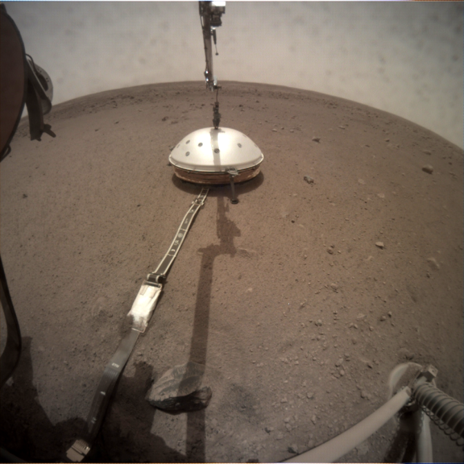 InSight's seismometer measures mars quakes from beneath a wind and thermal shield.