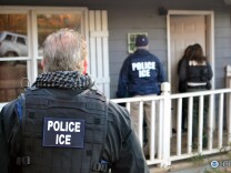 File: In this handout provided by U.S. Immigration and Customs Enforcement, foreign nationals were arrested this week during a targeted enforcement operation conducted by U.S. Immigration and Customs Enforcement (ICE) aimed at immigration fugitives, re-entrants and at-large criminal aliens Feb. 9, 2017 in Atlanta, Georgia.