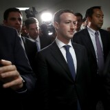 WASHINGTON, DC - APRIL 09:  Facebook CEO Mark Zuckerberg (C) leaves the office of Sen. Dianne Feinstein (D-CA) after meeting with Feinstein on Capitol Hill on April 9, 2018 in Washington, DC. Zuckerberg is meeting with individual senators in advance of tomorrow's scheduled hearing before the Senate Judiciary and Commerce committeees. Zuckerberg is under pressure to explain why tens of millions of Facebook user's private information was shared with Cambridge Analytica. (Photo by Win McNamee/Getty Images)