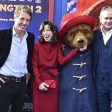 WESTWOOD, CA - JANUARY 06:  (L-R) Actors Hugh Grant, Sally Hawkins, and Hugh Bonneville arrive at the premiere of Warner Bros. Pictures' "Paddington 2" at Regency Village Theatre on January 6, 2018 in Westwood, California.  (Photo by Rodin Eckenroth/Getty Images)