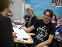 Senior Christophe Saucier hands back his completed voter registration form during a student voter drive at North Hollywood High School on Thursday, April 30, 2015. The drive was put on by the Los Angeles County Clerk, Arts for LA and the United Way.