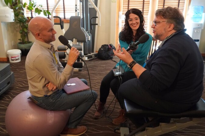 The Frame host John Horn and producer Michelle Lanz interview Guillermo del Toro in a gym at the Hotel Telluride during the Telluride Film Festival where del Toro's movie "The Shape of Water" made its North American premiere.