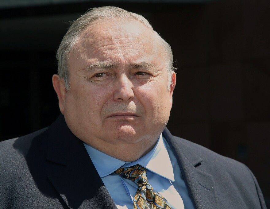 File: Former Bell city manager Robert Rizzo, listens to questions from the media, as he leaves the Edward R. Roybal Federal building and United States courthouse Monday, April 14, 2014.