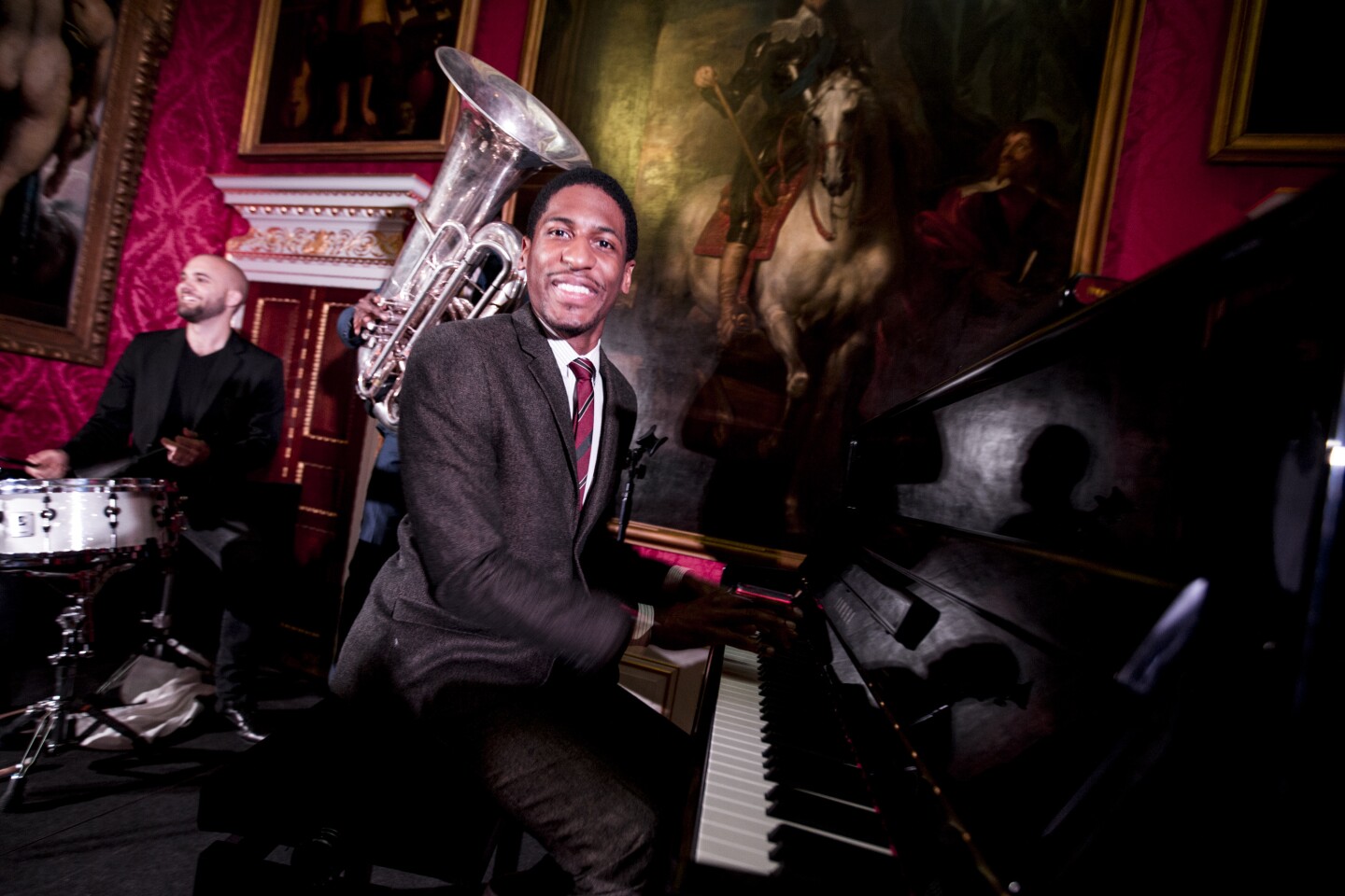 Jon Batiste performs live on stage at the Marketing Society event during day two of Advertising Week Europe at Kensington Palace State Apartments on April 1, 2014 in London, England.