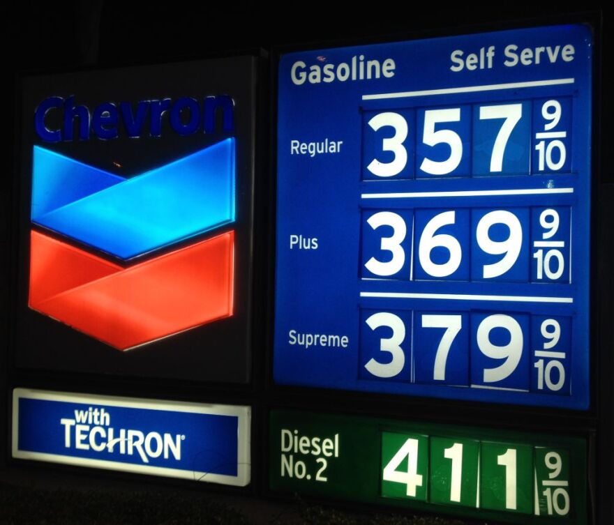 Crude oil prices are way down, but gas prices at the pump have barely budged.