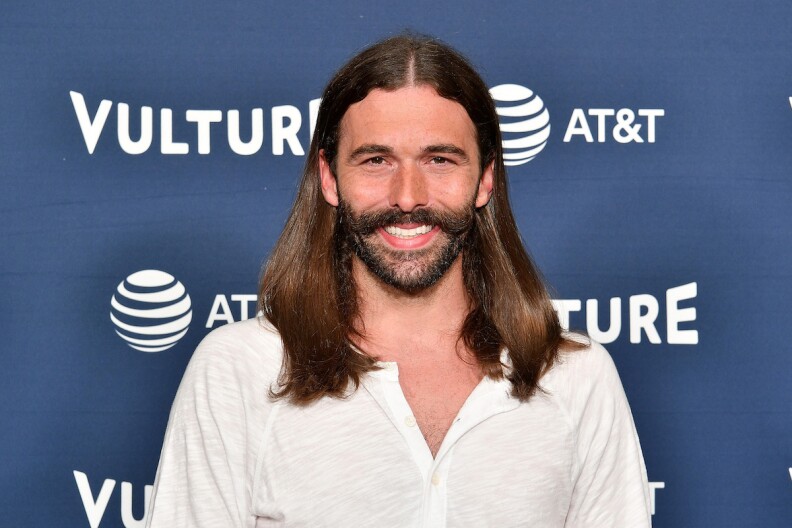 headshot of Jonathan Van Ness in a white shirt