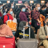 HONG KONG, CHINA - JANUARY 23: Travellers wearing face mask wait at the departure hall of West Kowloon Station on January 23, 2020 in Hong Kong, China. Hong Kong reported its first two cases of Wuhan coronavirus infections as the number of those who have died from the virus in China climbed to seventeen on Wednesday and cases have been reported in other countries including the United States,Thailand, Japan, Taiwan, and South Korea. (Photo by Anthony Kwan/Getty Images)