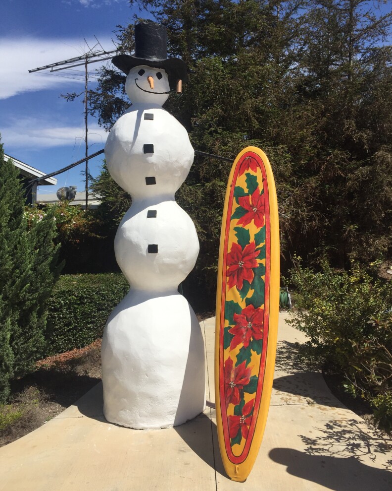 Surfing snowman in Oxnard.