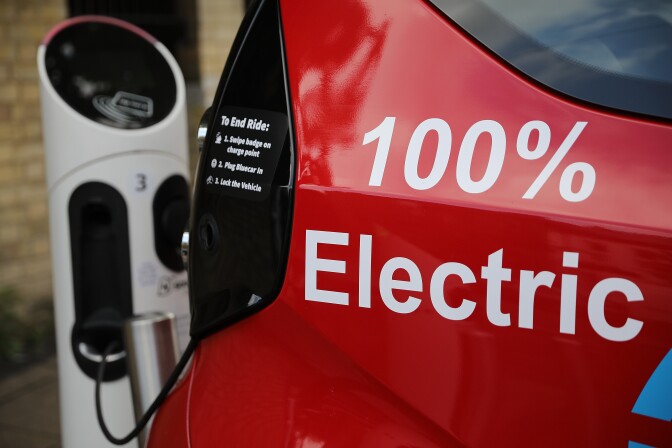 LONDON, ENGLAND - AUGUST 17:  A charging plug connects an electric vehicle (EV) to a charging station on August 17, 2017 in London, England. A study commissioned by power generation company Drax shows that current electric car models are twice as green as they were five years ago.  (Photo by Dan Kitwood/Getty Images)