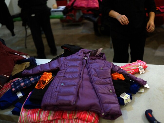 Winter coats sit in a warehouse at the annual New York Cares coat drive, on December 16, 2013 in New York City.
