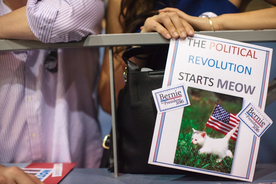 Supporters hold fun placards during a campaign rally for US Democratic presidential candidate Bernie Sanders in Salem, Oregon, May 10, 2016. 
