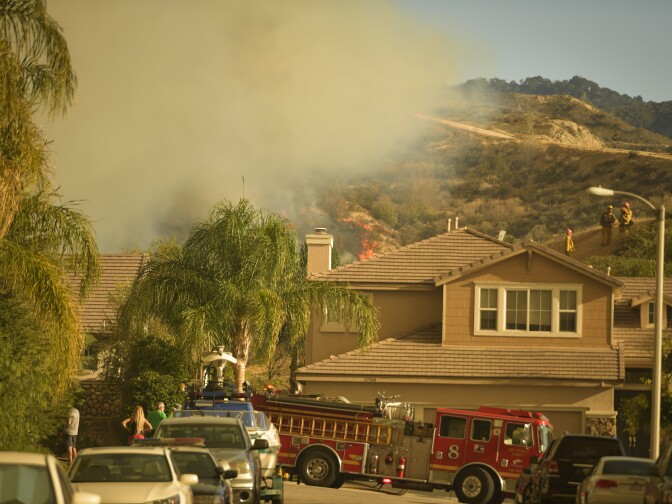 The Sand Fire smolders near homes off Golden Valley Rd Sunday afternoon. 


The Sand Fire burns in the Angeles National Forest Sunday July 24th, 2016 under a Red Flag Warning high high winds. The fire had burned 22,000 acres by Sunday morning and was 10% contained as firefighters battled low humidity, shifting wind, and high temperatures. An unknown number of structures were lost. 