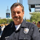 American flags were front and center, and the police presence was minimal, as marchers headed toward City Hall in downtown Los Angeles.