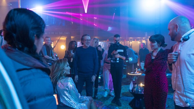 Writer/director Lorene Scafaria, right, on the set of "Hustlers" with Jennifer Lopez.