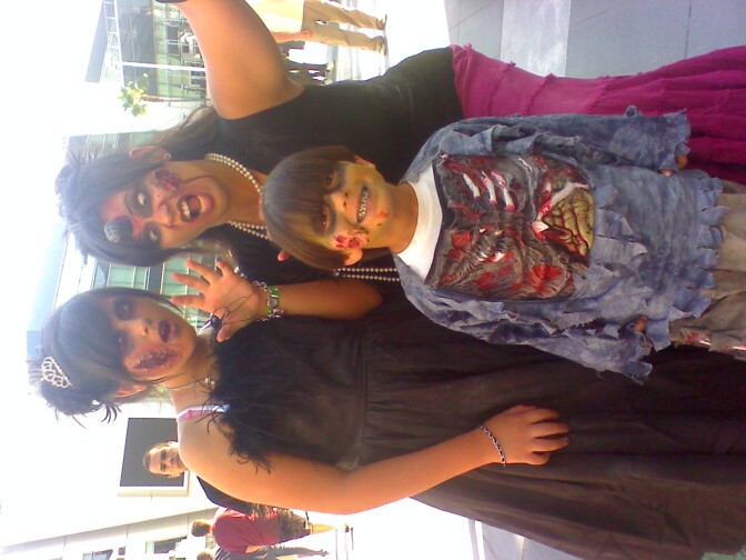 Katherine Toy and her children dress up to dance to Thriller at L.A. Live