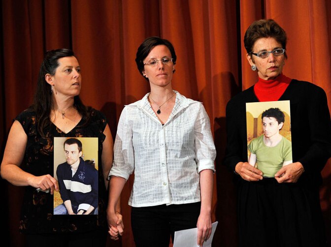 Sarah Shourd (center) stands with Cindy Hickey, mother of Shane Bauer (left) and Laura Fattal, mother of Josh Fattal during a news conference on Sunday in New York City. Shourd was freed last week after being held in Iran for more than 13 months and accused of spying. Fattal and Bauer remain imprisoned.