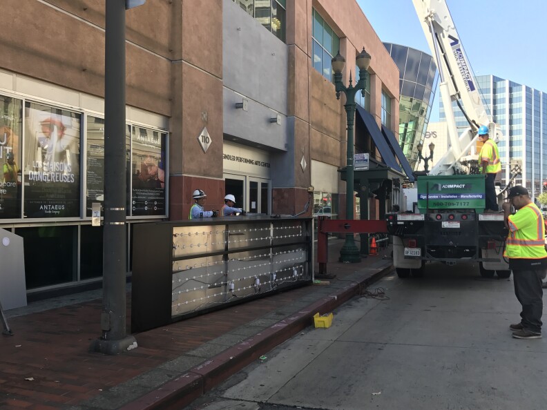 A crane lifting Antaeus’s marquee into place in September 2017. Photo credit: Ana Rose O'Halloran, executive director of Antaeus Theater.