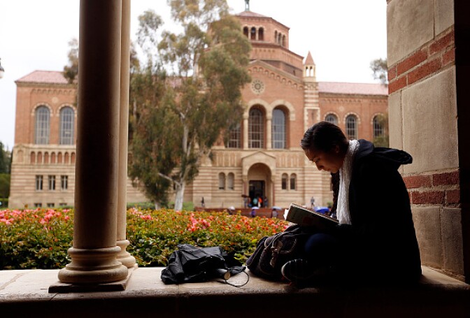 LOS ANGELES, CA - MAY 14: Jenna Tokeshi, a senior studies at the UCLA campus on May 14, 2015 as California students at the University of California are getting a two-year reprieve from threatened tuition increases as a result of a large infusion of new state funds to the 10-campus university system in Gov. Jerry Brown's proposed spending plan. (Photo by Al Seib/Los Angeles Times via Getty Images)