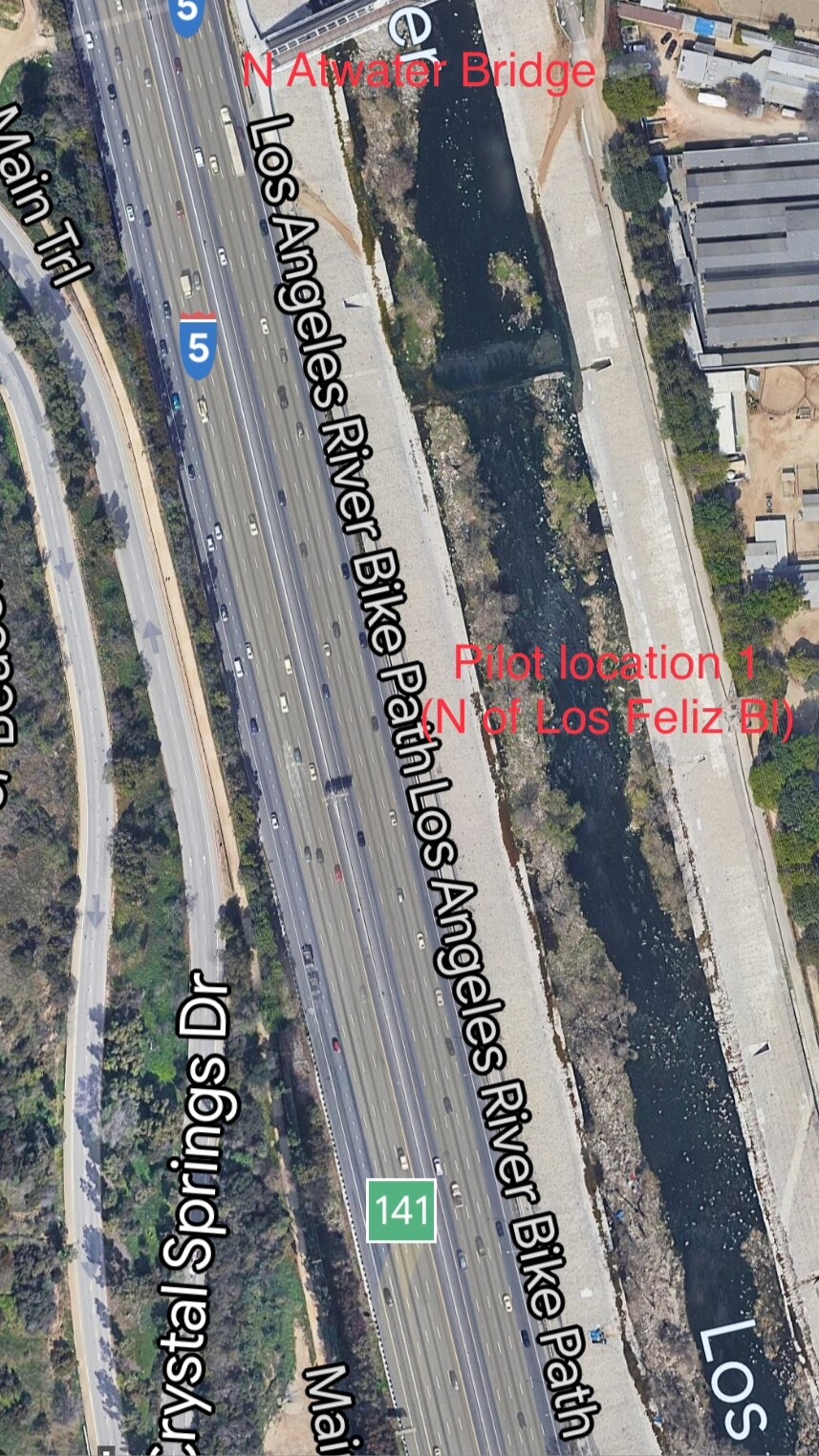 A overhead image of a freeway and surrounding roads