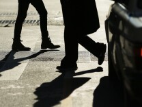 NEW YORK, NY - OCTOBER 27: Pedestrians cross the intersection of 3rd Avenue and 14th Street, one of Manhattan's most dangerous crosswalks for pedestrians, on October 27, 2014 in New York City. Four  pedestrians have been killed in the last few weeks in New York City while a total of 212 people have been killed in total  traffic deaths so far this year. These numbers have added to the urgency of Mayor Bill de Blasio's Vision Zero program, which aims to eliminate city traffic deaths. (Photo by Spencer Platt/Getty Images)