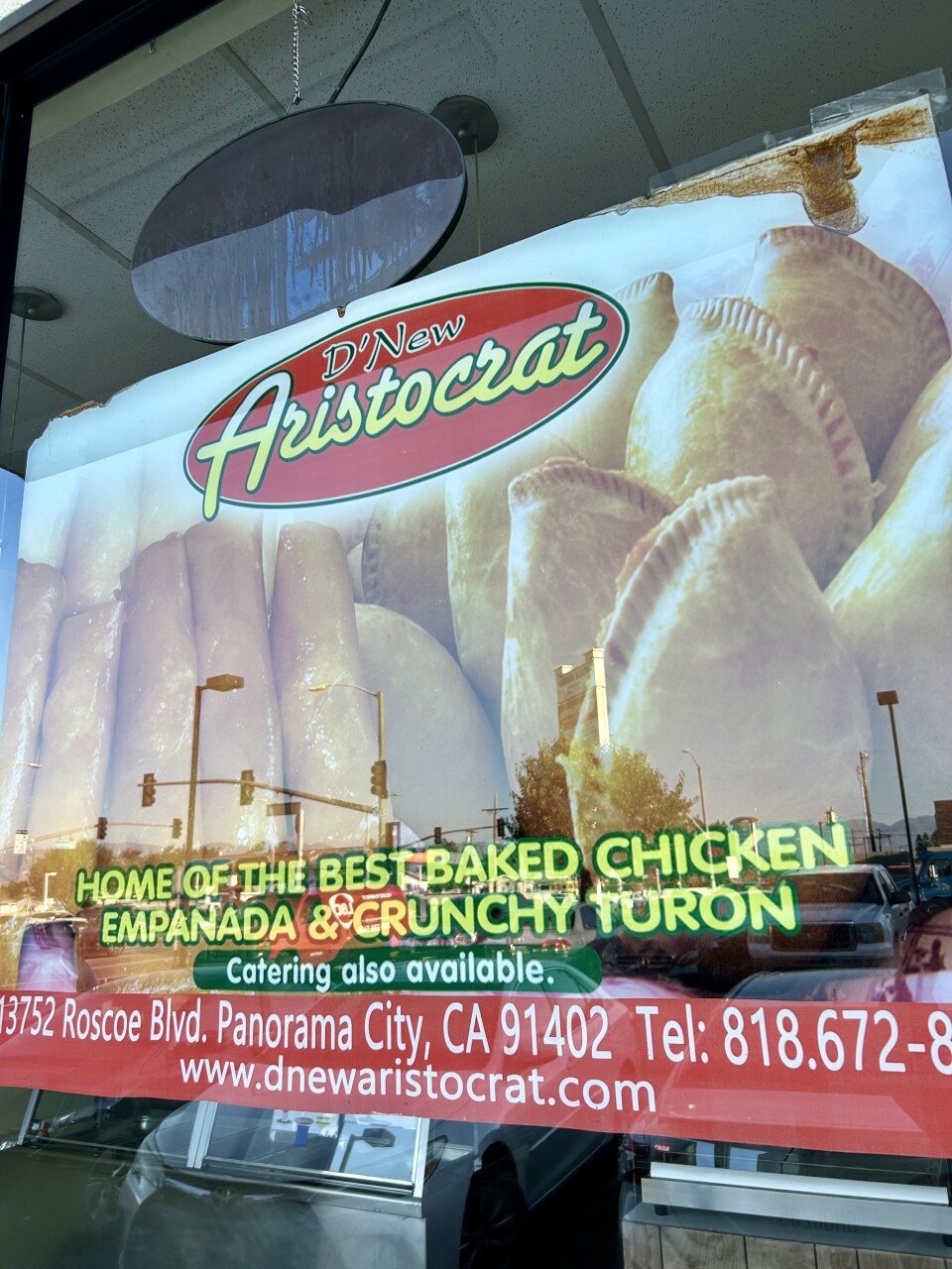 A window sign shows pastries.