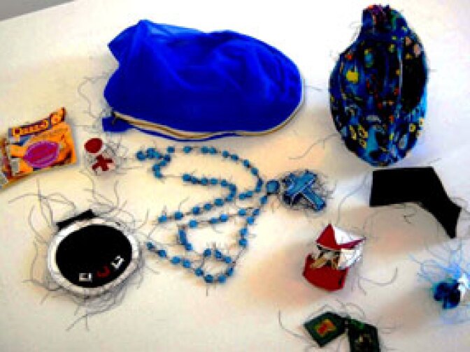 Replica of an undocumented immigrant’s backpack and contents made from vinyl, thread and other materials.