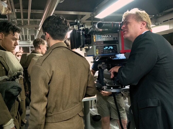 "Dunkirk" director Christopher Nolan on set with actors Harry Styles (Left) and Fionn Whitehead (Middle).