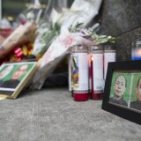 NEW YORK, NY - DECEMBER 21: A memorial of candles and flowers in front of the New York Police Department's (NYPD) 84th Precinct on December 21, 2014 in the Brooklyn borough of New York City. NYPD officers, Wenjian Liu and Rafael Ramos, of the 84th Precinct were killed execution style on December 20 as they sat in their marked police car on a Brooklyn street corner. The suspect, identified as 28-year-old Ismaaiyl Brinsley who allegedly shot ex-girlfriend in Baltimore earlier in the day, was apparently motivated by the deaths of Eric Garner and Michael Brown. According to police, Brinsley shot himself in the head on the subway platform and was transported to Brooklyn Hospital where he was pronounced dead.  (Photo by Michael Graae/Getty Images)