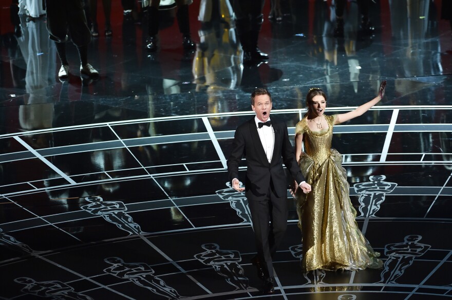 HOLLYWOOD, CA - FEBRUARY 22:  Host Neil Patrick Harris (L) and actress Anna Kendrick onstage during the 87th Annual Academy Awards at Dolby Theatre on February 22, 2015 in Hollywood, California.  (Photo by Kevin Winter/Getty Images)