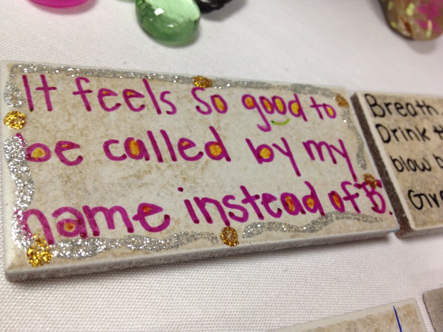 One girl wrote on, "It feels so good to be called by my name instead of B." Girls expressed their experiences with pimps through art project at an empowerment conference for sexually exploited teens.