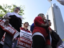 Demonstrators protest LAUSD's proposed budget cuts at a rally at L.A.'s Pershing Square on Friday, May 13, 2011.