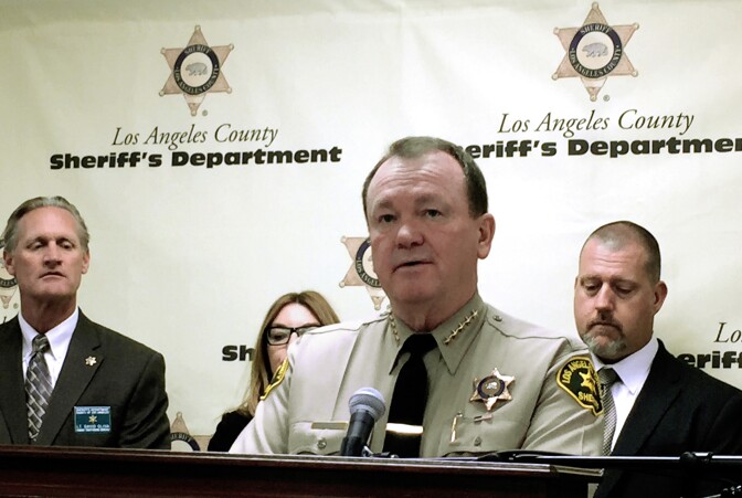 Los Angeles County Sheriff Jim McDonnell announces the arrests of three people for trafficking a Los Angeles woman after fooling her into thinking she was going to a birthday party. McDonnell spoke at a news conference on March 9, 2016.