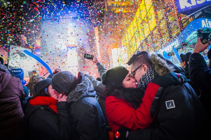Couples kiss after midnight in Times Square during the New Years Eve celebration on January 1, 2013 in New York City.  