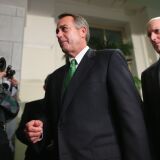 Speaker of the House John Boehner (R-OH) (C) leaves the second House Republican Caucus meeting of the day with House Ways and Means Committee Chairman Dave Camp (R-MI) (R) during a rare New Year's Day session  January 1, 2013 in Washington, DC. 