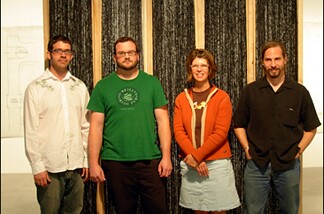 (L-R) UCR MFA grads Matthew Bryant, Jason Lutz, and Cheryl Gilge, posing with Sweeney Art Gallery's Shane Shukis, in front of Gilge's "Making as Thinking."