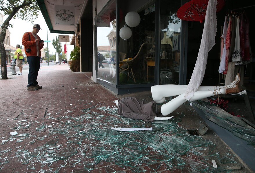 NAPA, CA - AUGUST 24:  A mannequin lays in broken glass in front of a damaged buillding following a reported 6.0 earthquake on August 24, 2014 in Napa, California.  A 6.0 earthquake rocked the San Francisco Bay Area shortly after 3:00 am on Sunday morning causing damage to buildings and sending at least 70 people to a hospital with non-life threatening injuries.  (Photo by Justin Sullivan/Getty Images)