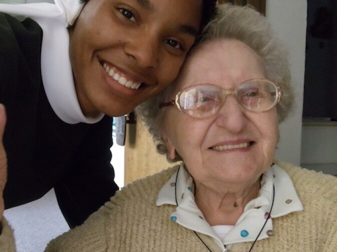 Sister Desire Anne Marie Findlay, 26, left, with an older nun, Sister Genette.