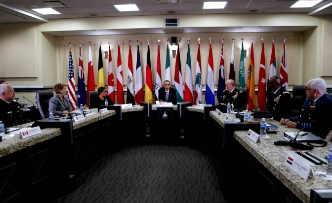 ANDREWS AIR FORCE BASE, MD - OCTOBER 14:  U.S. President Barack Obama (C), Joint Chiefs of Staff General Martin E. Dempsey (R), US National Security Advisor Susan Rice (L), U.S. Homeland Security Advisor Lisa Monaco (2nd L) and U.S. Central Command General Lloyd Austin III (2nd R) meet 20 foreign Chiefs of Defense to discuss coalition efforts in the ongoing campaign against ISIS on October 14, 2014 at Andrew Air Force Base in Maryland. Representatives from Australia, Bahrain, Belgium, Canada, Denmark, Egypt, France, Germany, Iraq, Italy, Jordan, Kuwait, Lebanon, the Netherlands, New Zealand, Qatar, Saudi Arabia, Spain, Turkey and the United Arab Emirates also attended the meeting. (Photo by Aude Guerrucci-Pool/Getty Images)